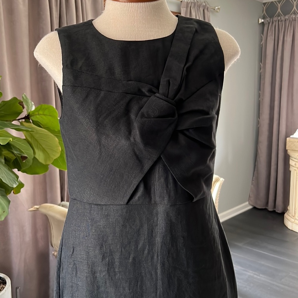 Black linen day time dress with folding on the bodice